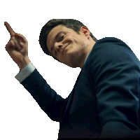 a man in a suit is pointing upwards