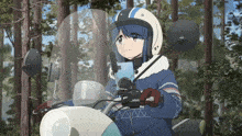a girl in a helmet is riding a motorcycle through the woods