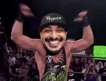 a man wearing a hat that says blizzard on it is smiling