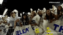 a group of people holding up a banner that says pelea