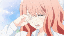 a girl with long pink hair is covering her face with her hand