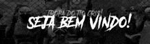 a black and white photo with the words seja bem vindo written in white