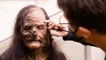 Retouching Guillermo Del Toros Cabinet Of Curiosities GIF - Retouching Guillermo Del Toros Cabinet Of Curiosities Getting My Make Up Done GIFs