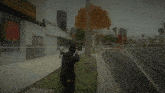 a man in a black jacket is walking down a street with a yellow fire hydrant