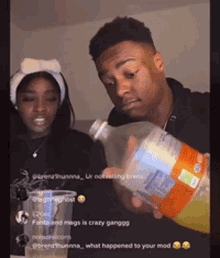 a man is pouring a bottle of soda into a glass