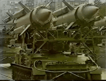a bunch of missiles are sitting on top of a military vehicle