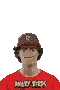 a man wearing a baseball cap and a red shirt is making a funny face .