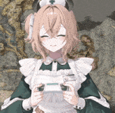 a girl in a maid outfit is holding a game controller