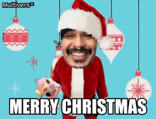 a man in a santa suit is smiling and says merry christmas