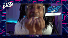 a man wearing headphones is on a screen with the words oh sub gift