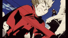 a man in a red jacket is standing on top of a snowy hill