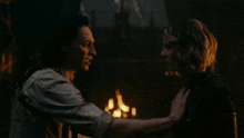a man and a woman are looking at each other with sylvie stop written on the screen