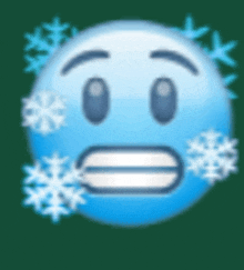 a blue smiley face with snowflakes coming out of it 's mouth