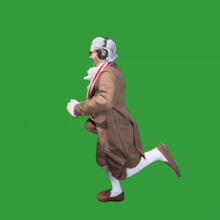 a man in a brown coat and white socks is running on a green background