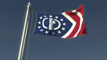 a flag that says gd on it is waving in the wind