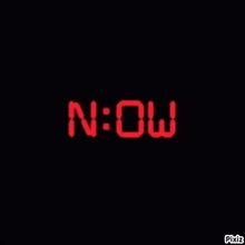 a neon sign that says now on it