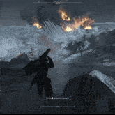 a video game screen shows a soldier standing in front of a fire and says press to switch weapon at the bottom