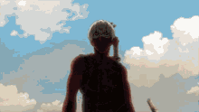 a man in a mask is standing in front of a blue sky with clouds .