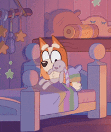 a cartoon dog is sitting on a bed with a stuffed animal
