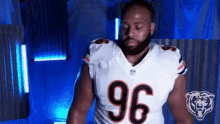 a man in a bears jersey with the number 96 on it
