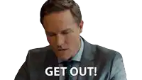 a man in a suit and tie says " get out " in front of a white background