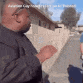 a man talking to another man with the words aviation guy honest reaction to twisted on the bottom