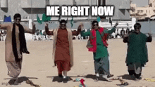 a group of men are dancing together in a field with the words `` me right now '' written above them .