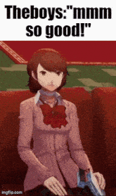 a girl in a pink sweater is sitting on a couch holding a gun and a book .