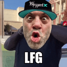 a man with a beard wearing a blizzard hat