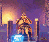 a man is sitting in a chair with a tnlw logo in the background