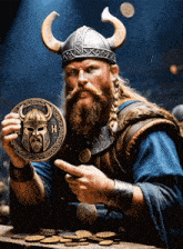 a bearded man in a viking helmet holds a coin with the letter h on it