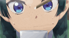 a close up of a girl 's face with blue eyes drinking from a cup