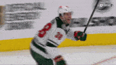 a hockey player with the number 8 on his shirt