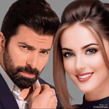 a man and a woman are standing next to each other and the woman 's face is made with videoshow
