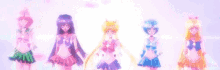 a group of sailor moon characters standing in a line