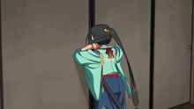 a girl in a kimono is reaching for a door handle