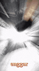 a black and white poster with the word enggaar on it