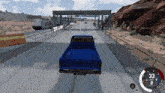 a blue truck is driving down a road in a video game with a speedometer reading 33 mph