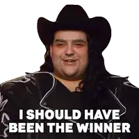 a man with long hair wearing a cowboy hat and a jacket says i should have been the winner