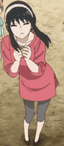 a girl in a pink shirt and gray leggings is standing in the dirt with her eyes closed .