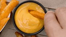 Taco Bell Nacho Fries GIF - Taco Bell Nacho Fries Cheese Dip GIFs