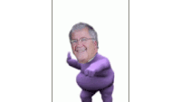 a man in a purple suit is dancing with his arms outstretched .