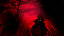 a person is holding a black object in their hands