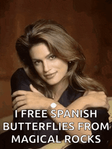 a woman is sitting on a couch with her arms crossed and says i free spanish butterflies