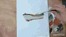 a person is painting a boat on a canvas with the words made in animatica below it