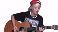 playing guitar carson lueders say somethin song playing musical instrument enjoying the rhythm
