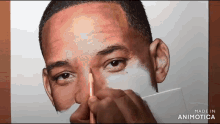 a pencil drawing of a man 's face is made in animatica
