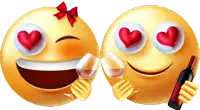 two smiley faces with hearts in their eyes holding wine glasses