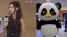 a woman talking into a microphone next to a stuffed panda