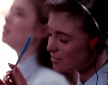 headphones britny fox girlschool rocking out walkman